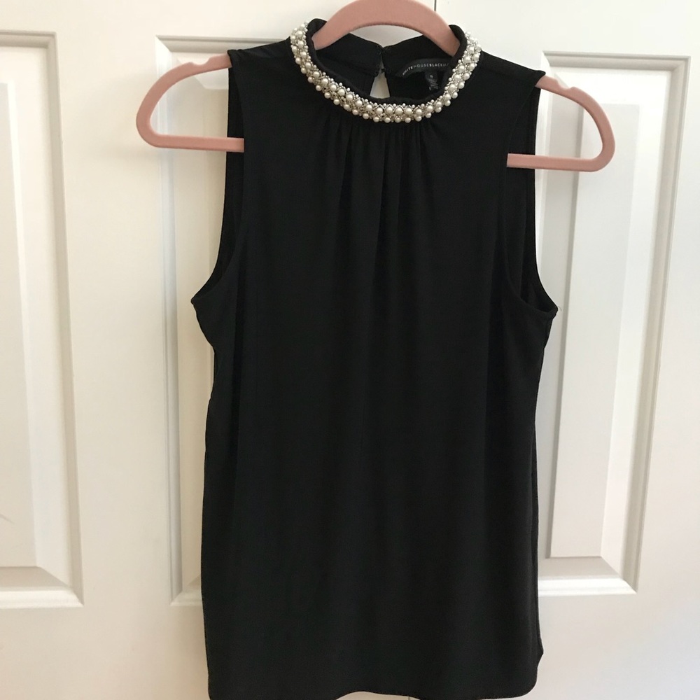 Black sleeveless dressy top. Pearl neckline. WHBM